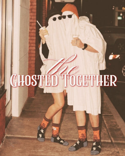 Ghosted Together — two ghosts hugging on a street